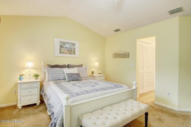 With a private, tranquil water and golf course view, this bright on Spruce Creek Golf Club in Florida - for sale on GolfHomes.com, golf home, golf lot