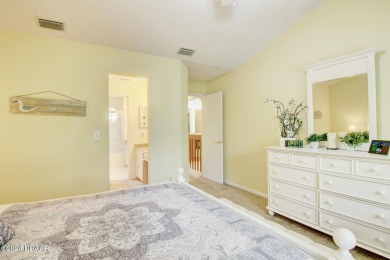 With a private, tranquil water and golf course view, this bright on Spruce Creek Golf Club in Florida - for sale on GolfHomes.com, golf home, golf lot