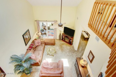 With a private, tranquil water and golf course view, this bright on Spruce Creek Golf Club in Florida - for sale on GolfHomes.com, golf home, golf lot