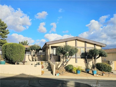 A well-kept spacious home nestled in a beautiful 55+ community on Sun Lakes Country Club in California - for sale on GolfHomes.com, golf home, golf lot