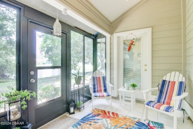 With a private, tranquil water and golf course view, this bright on Spruce Creek Golf Club in Florida - for sale on GolfHomes.com, golf home, golf lot