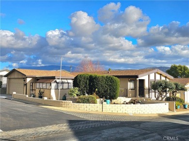 A well-kept spacious home nestled in a beautiful 55+ community on Sun Lakes Country Club in California - for sale on GolfHomes.com, golf home, golf lot