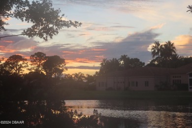 With a private, tranquil water and golf course view, this bright on Spruce Creek Golf Club in Florida - for sale on GolfHomes.com, golf home, golf lot
