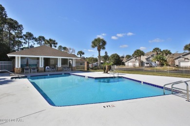 With a private, tranquil water and golf course view, this bright on Spruce Creek Golf Club in Florida - for sale on GolfHomes.com, golf home, golf lot
