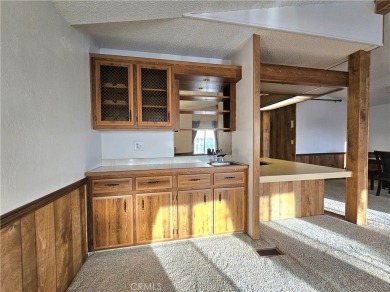A well-kept spacious home nestled in a beautiful 55+ community on Sun Lakes Country Club in California - for sale on GolfHomes.com, golf home, golf lot