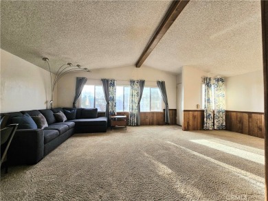 A well-kept spacious home nestled in a beautiful 55+ community on Sun Lakes Country Club in California - for sale on GolfHomes.com, golf home, golf lot