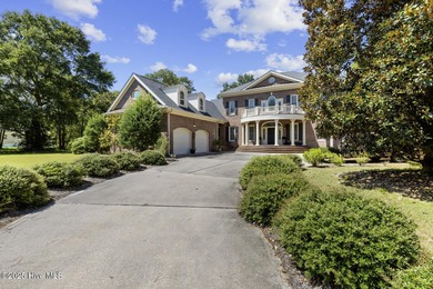 This beautiful brick home in River Landing seamlessly blends on River Landing Golf Course in North Carolina - for sale on GolfHomes.com, golf home, golf lot