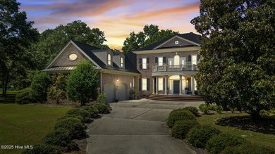 This beautiful brick home in River Landing seamlessly blends on River Landing Golf Course in North Carolina - for sale on GolfHomes.com, golf home, golf lot