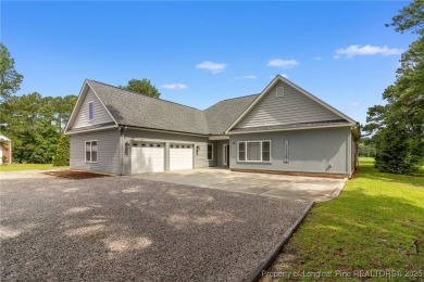 Custom-built golf course home in the highly sought-after, gated on Carolina Trace Country Club in North Carolina - for sale on GolfHomes.com, golf home, golf lot