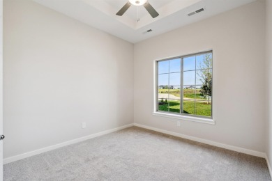 Located just a short golf cart ride from Denali's on the River on River Ridge Golf Club in Iowa - for sale on GolfHomes.com, golf home, golf lot