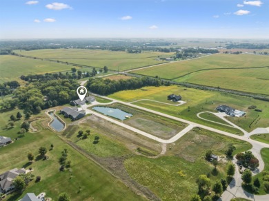 Located just a short golf cart ride from Denali's on the River on River Ridge Golf Club in Iowa - for sale on GolfHomes.com, golf home, golf lot