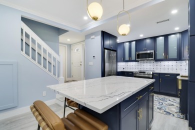 WOW! HIGHLY SOUGHT AFTER & rarely avail PET FRIENDLY END UNIT on on Jupiter Dunes Golf Course in Florida - for sale on GolfHomes.com, golf home, golf lot