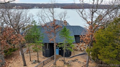 This exceptional lakefront home in Tan-Tar-A Estates at the 26MM on The Oaks Golf Course in Missouri - for sale on GolfHomes.com, golf home, golf lot