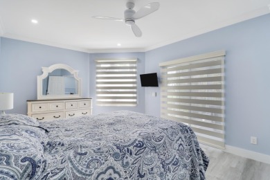 WOW! HIGHLY SOUGHT AFTER & rarely avail PET FRIENDLY END UNIT on on Jupiter Dunes Golf Course in Florida - for sale on GolfHomes.com, golf home, golf lot