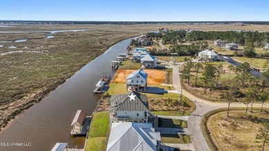 Experience the ultimate in coastal living with this exquisite on Diamondhead Country Club in Mississippi - for sale on GolfHomes.com, golf home, golf lot