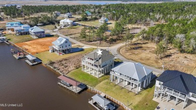 Experience the ultimate in coastal living with this exquisite on Diamondhead Country Club in Mississippi - for sale on GolfHomes.com, golf home, golf lot