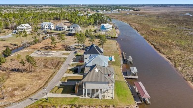 Experience the ultimate in coastal living with this exquisite on Diamondhead Country Club in Mississippi - for sale on GolfHomes.com, golf home, golf lot