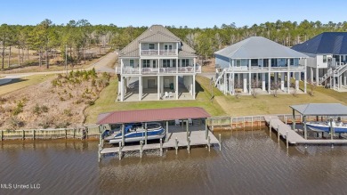 Experience the ultimate in coastal living with this exquisite on Diamondhead Country Club in Mississippi - for sale on GolfHomes.com, golf home, golf lot