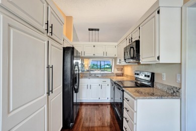 Renovated Dream Condo with Stunning Golf & Lake Views in on The Golf Club of Jupiter in Florida - for sale on GolfHomes.com, golf home, golf lot