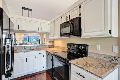 Renovated Dream Condo with Stunning Golf & Lake Views in on The Golf Club of Jupiter in Florida - for sale on GolfHomes.com, golf home, golf lot