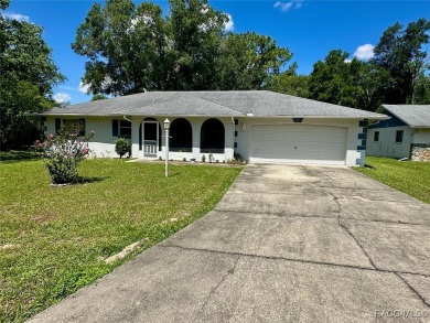 Nestled on a spacious, lush lot in the heart of Beverly Hills' on Brentwood Farms Golf Club in Florida - for sale on GolfHomes.com, golf home, golf lot