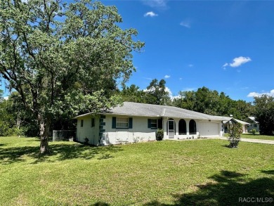 Nestled on a spacious, lush lot in the heart of Beverly Hills' on Brentwood Farms Golf Club in Florida - for sale on GolfHomes.com, golf home, golf lot