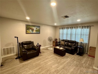 Nestled on a spacious, lush lot in the heart of Beverly Hills' on Brentwood Farms Golf Club in Florida - for sale on GolfHomes.com, golf home, golf lot