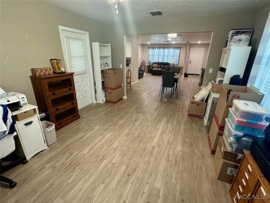 Nestled on a spacious, lush lot in the heart of Beverly Hills' on Brentwood Farms Golf Club in Florida - for sale on GolfHomes.com, golf home, golf lot