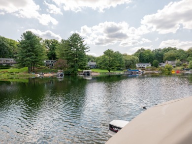 Enjoy lake living in the sought-after Lake Doster community on Lake Doster Golf Club in Michigan - for sale on GolfHomes.com, golf home, golf lot