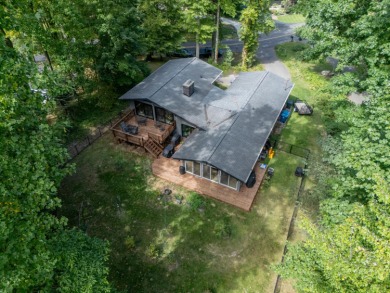 Enjoy lake living in the sought-after Lake Doster community on Lake Doster Golf Club in Michigan - for sale on GolfHomes.com, golf home, golf lot