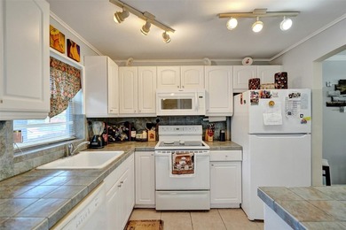 Nestled in the vibrant 55+ community of Sunrise Lakes, this on Sunrise Lakes Phase III in Florida - for sale on GolfHomes.com, golf home, golf lot