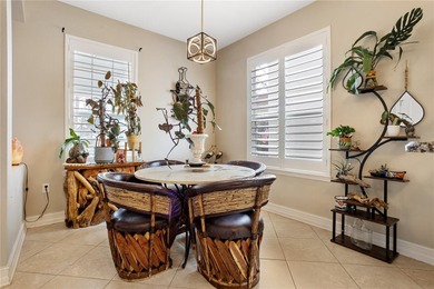 Charming modern Southern-style two-story home with double front on Harmony Golf Preserve in Florida - for sale on GolfHomes.com, golf home, golf lot