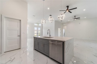 Welcome to effortless luxury in the coveted Royal Palm Golf on Eagle Lakes Golf Club in Florida - for sale on GolfHomes.com, golf home, golf lot