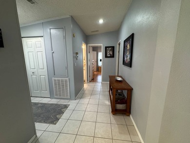 Welcome to your perfect Florida oasis with panoramic golf course on Schalamar Creek Golf and Country Club in Florida - for sale on GolfHomes.com, golf home, golf lot