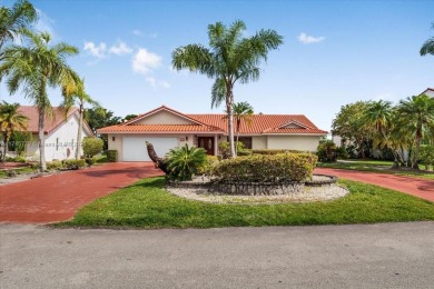 Welcome to Les Jardins, nestled within the prestigious Woodmont on Woodmont Country Club in Florida - for sale on GolfHomes.com, golf home, golf lot