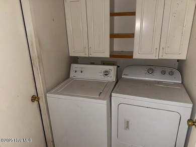 Two bedrooms, two and one half bath home nestled in the heart of on Inland Greens Golf Course in North Carolina - for sale on GolfHomes.com, golf home, golf lot