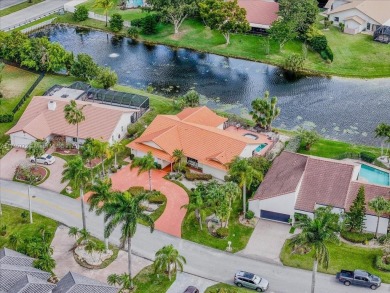 Welcome to Les Jardins, nestled within the prestigious Woodmont on Woodmont Country Club in Florida - for sale on GolfHomes.com, golf home, golf lot