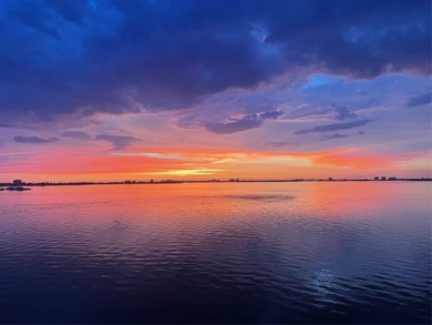 Move in Ready! Priced to sell! Enjoy mesmerizing sunsets all on Isla Del Sol Yacht and Country Club in Florida - for sale on GolfHomes.com, golf home, golf lot