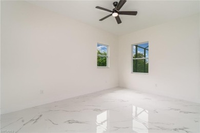 Welcome to effortless luxury in the coveted Royal Palm Golf on Eagle Lakes Golf Club in Florida - for sale on GolfHomes.com, golf home, golf lot