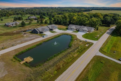 Located just a short golf cart ride from Denali's on the River on River Ridge Golf Club in Iowa - for sale on GolfHomes.com, golf home, golf lot