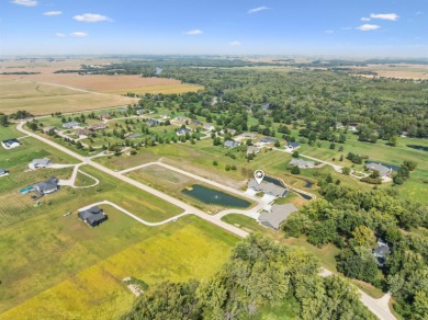 Located just a short golf cart ride from Denali's on the River on River Ridge Golf Club in Iowa - for sale on GolfHomes.com, golf home, golf lot