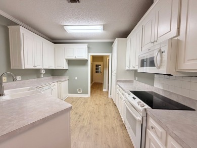 This 3 bed, 2.5 bath home feels spacious with tall 12' ceilings on Stone Creek Golf Club in Georgia - for sale on GolfHomes.com, golf home, golf lot
