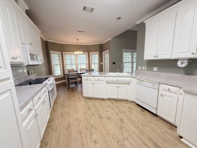 This 3 bed, 2.5 bath home feels spacious with tall 12' ceilings on Stone Creek Golf Club in Georgia - for sale on GolfHomes.com, golf home, golf lot