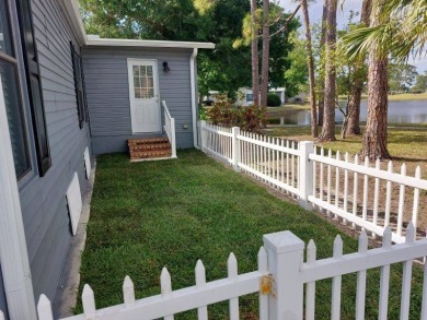 The Lot Rent for this home is $1,742.00/monthly.   This on Pine Lakes Country Club in Florida - for sale on GolfHomes.com, golf home, golf lot