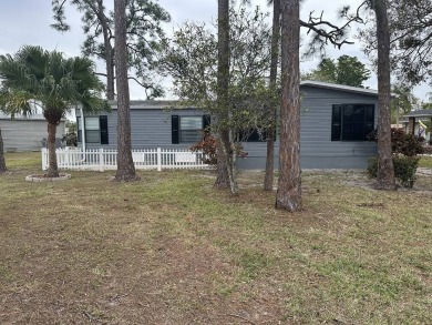 The Lot Rent for this home is $1,742.00/monthly.   This on Pine Lakes Country Club in Florida - for sale on GolfHomes.com, golf home, golf lot