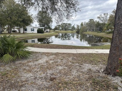 The Lot Rent for this home is $1,742.00/monthly.   This on Pine Lakes Country Club in Florida - for sale on GolfHomes.com, golf home, golf lot