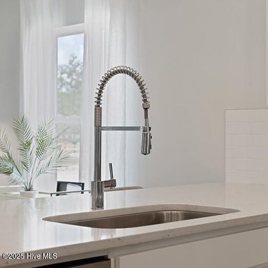 Live Exceptionally in Brunswick Plantation's Premier Golf on Brunswick Plantation and Golf Resorts in North Carolina - for sale on GolfHomes.com, golf home, golf lot