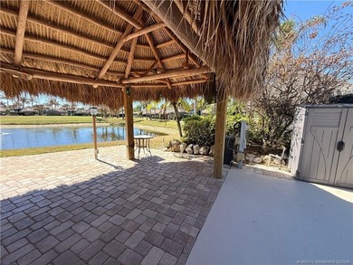 Nestled within an exclusive gated RV resort, this exceptional on St. Lucie Trail Golf Club in Florida - for sale on GolfHomes.com, golf home, golf lot