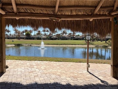 Nestled within an exclusive gated RV resort, this exceptional on St. Lucie Trail Golf Club in Florida - for sale on GolfHomes.com, golf home, golf lot