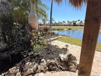 Nestled within an exclusive gated RV resort, this exceptional on St. Lucie Trail Golf Club in Florida - for sale on GolfHomes.com, golf home, golf lot